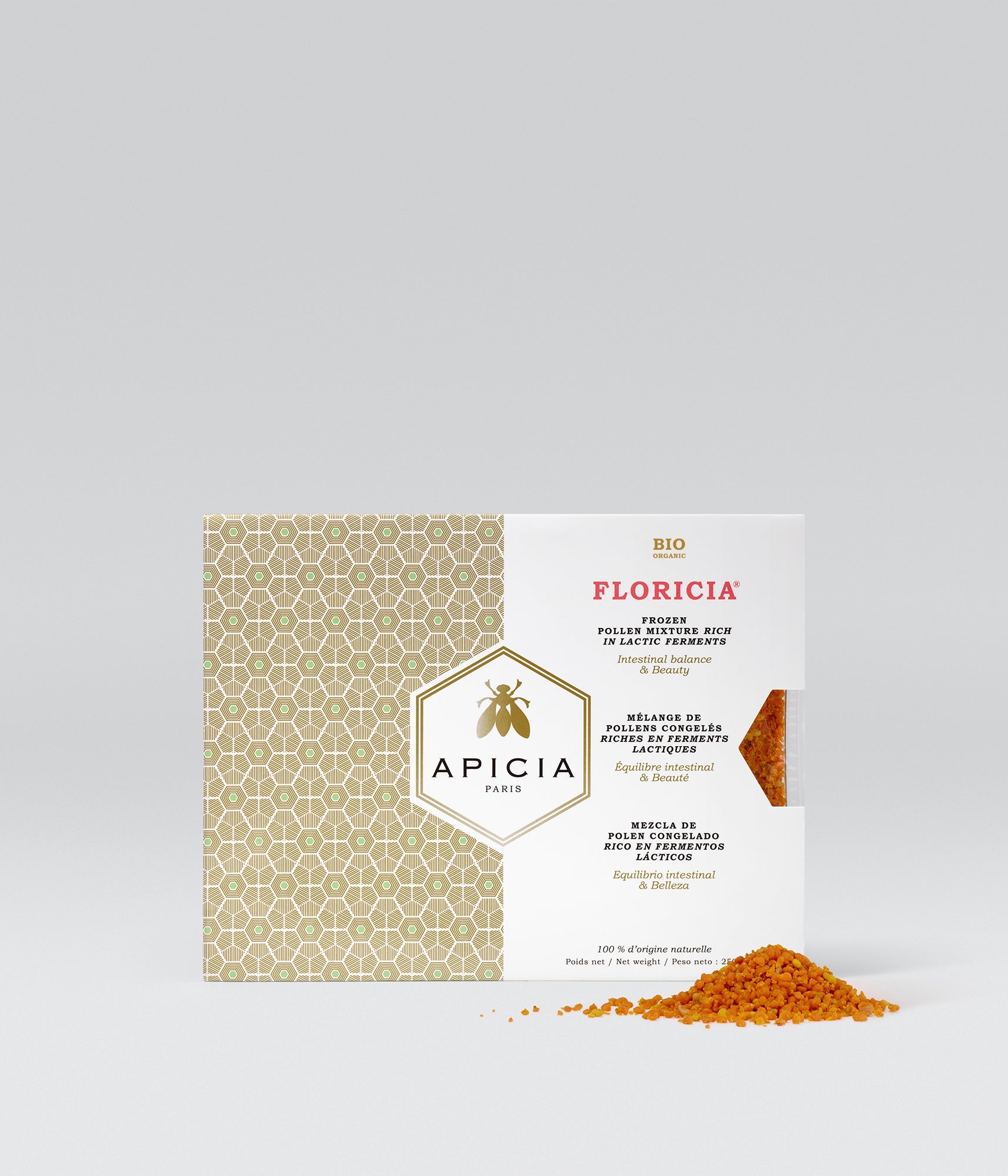 Packshot d'une boîte rectangulaire blanche et dorée de pollen frais FLORICIA BIO, sur fond gris.